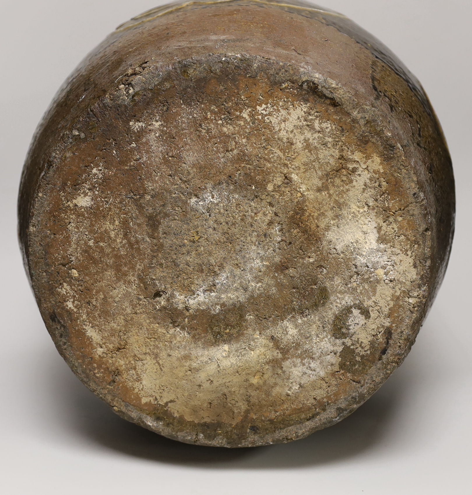 A large Chinese stoneware ovoid jar, decorated in relief with birds and flowers, possibly 19th century, 36cm high